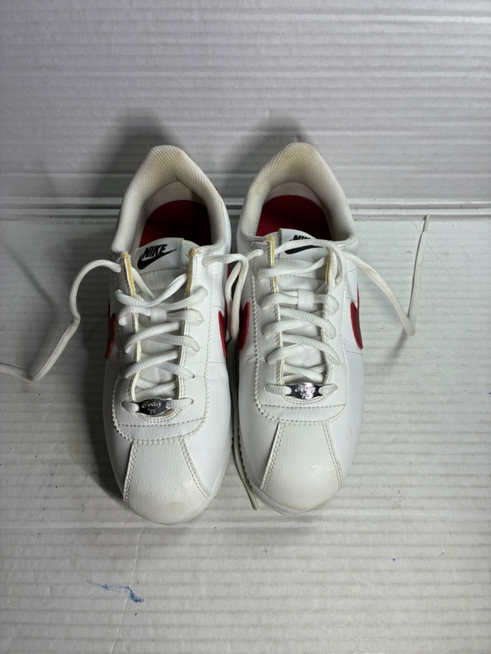Nike White Sneakers with Red Swoosh Accents USED SKU 904764-103